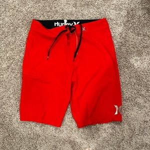 Red swim shorts
